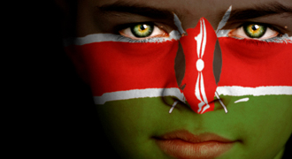 Image of Kenyan flag painted on a young boy's face
